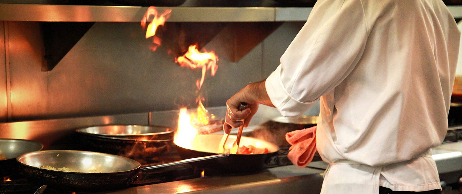 Chef cooking away in the Carmine's kitchen